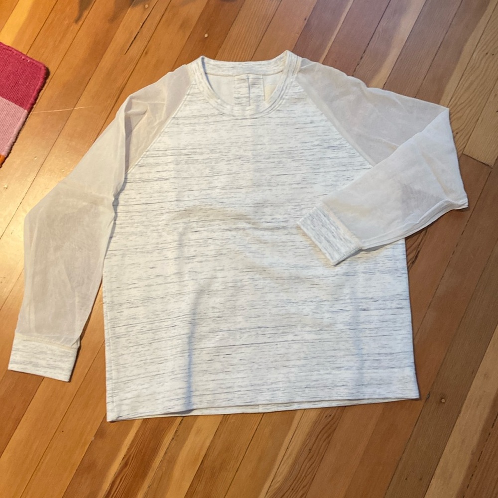 FOLK cream coloured long sleeve top, size small.